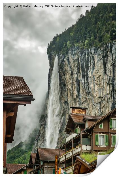 Lauterbrunnen town with waterfall backdrop Print by Robert Murray