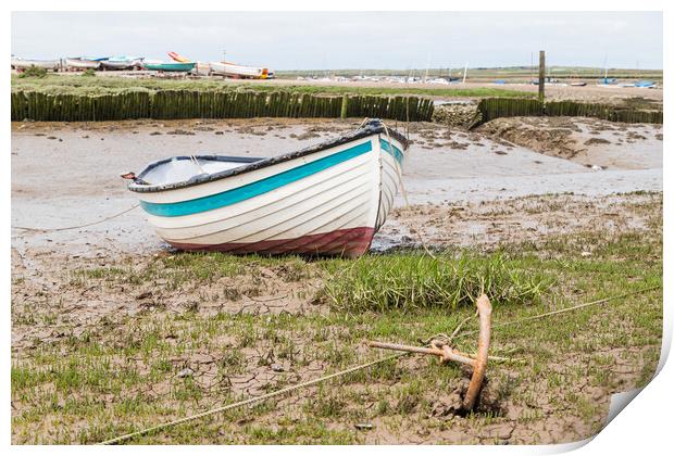 Boat anchored to the shore at Brancaster Staithe Print by Jason Wells