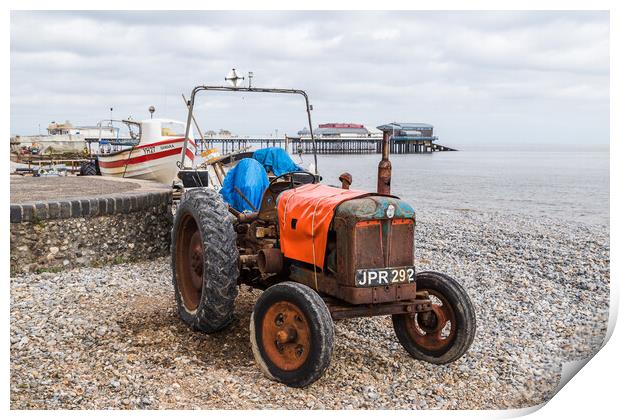 Old tractor on Cromer beach Print by Jason Wells