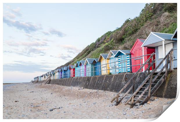 Beach huts line the promenade at Cromer Print by Jason Wells