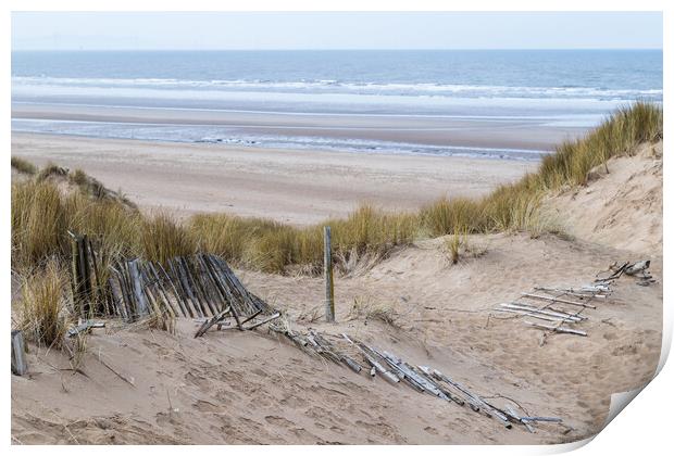 Fallen fence leading down to Formby beach Print by Jason Wells