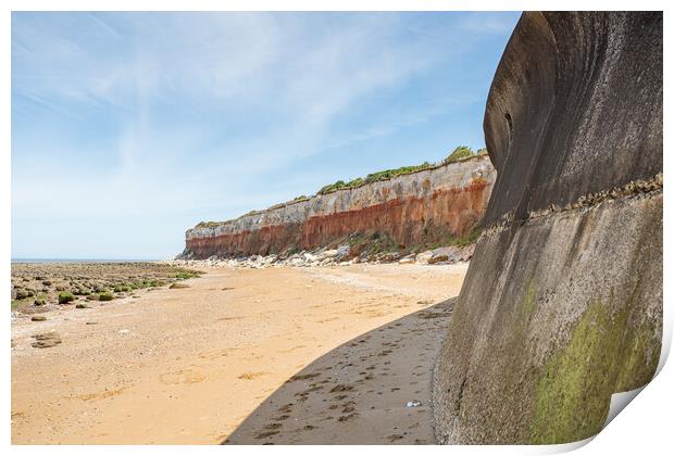 Sea wall at Hunstanton meets the cliffs Print by Jason Wells