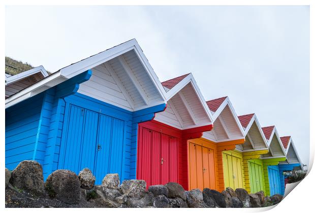 Vibrant beach huts in Scarborough Print by Jason Wells