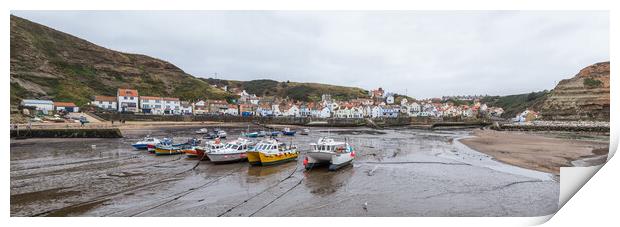 Boats lined up in the bay at Staithes at low tide Print by Jason Wells