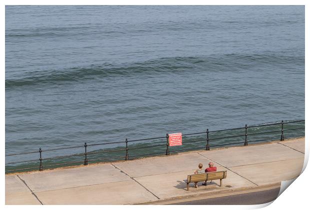 Looking down on a couple on the Scarborough promenade Print by Jason Wells