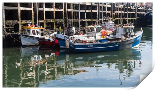 Cluster of fishing boats in Scarborough harbour Print by Jason Wells