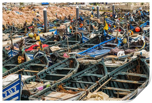 Wooden fishing boats lined up in Agadir harbour Print by Jason Wells