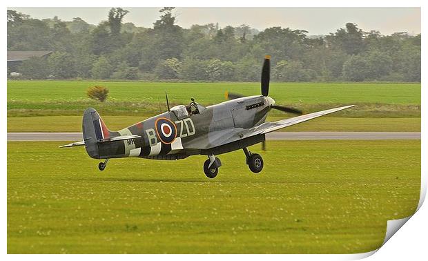 Spitfire touchdown at Duxford Print by Alex Haines