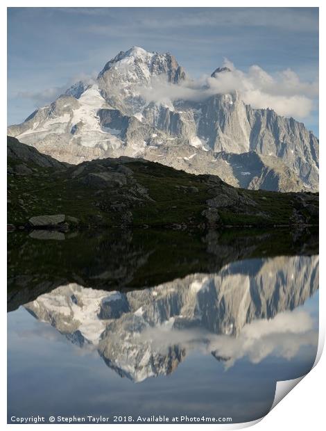 The Dru reflected in Lac des Cheserys Print by Stephen Taylor