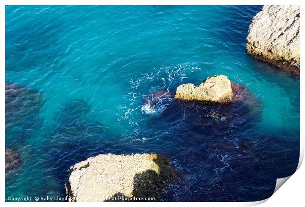 Turquoise sea at Nerja, Spain Print by Sally Lloyd