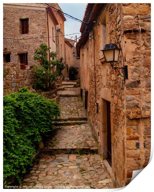 Mediterranean cobbled medieval street - Tossa De Mar Print by Miguel Herrera