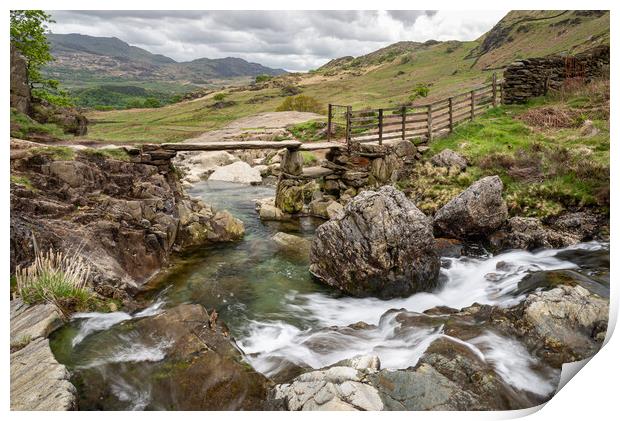 Stone footbridge in Cwm Llan, Snowdonia, Wales Print by Andrew Kearton