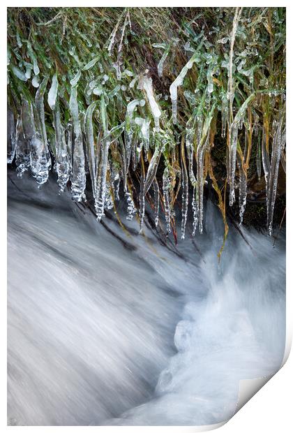 Icicles hanging over a moorland stream Print by Andrew Kearton