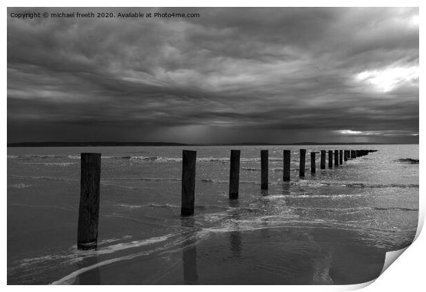 Stormy sky over Brean sands Print by michael freeth
