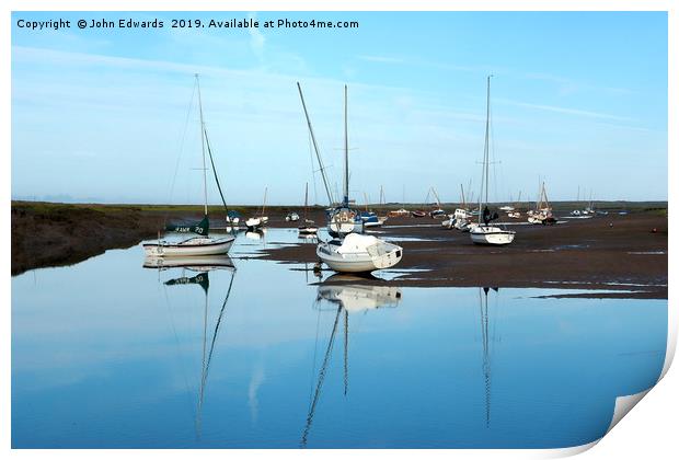 Reflections at Brancaster Staithe Print by John Edwards