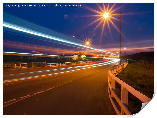Light trails over Seaton Sluice bridge Print by David Irving