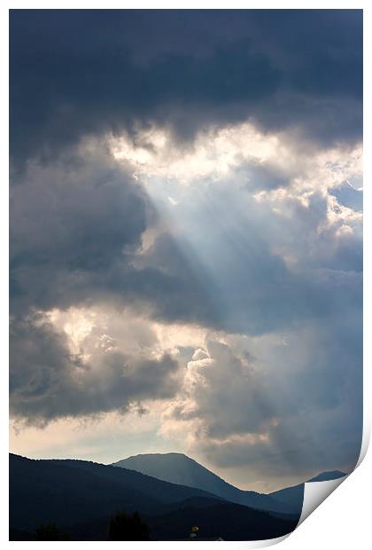 Sun rays through storm clouds Print by ken biggs