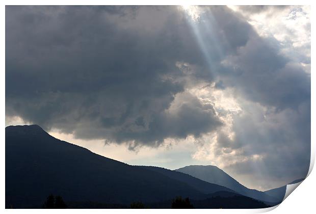 Sun rays through storm clouds Print by ken biggs