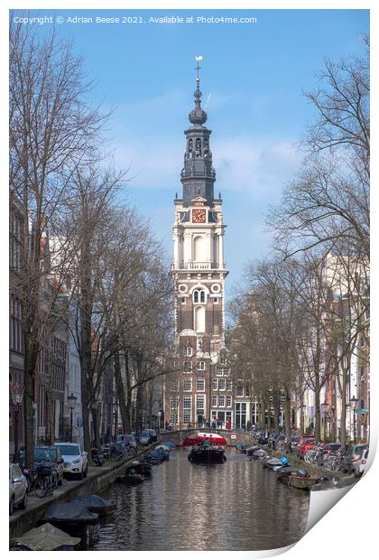 Ornate Church Clocktower at the end of a canal in Amsterdam Print by Adrian Beese