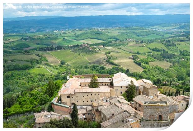 A view of Tuscany from a medieval tower in San Gimignano Print by Adrian Beese