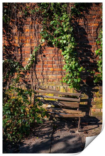 Old Wooden Broken Bench By The Brick Wall Print by Artur Bogacki