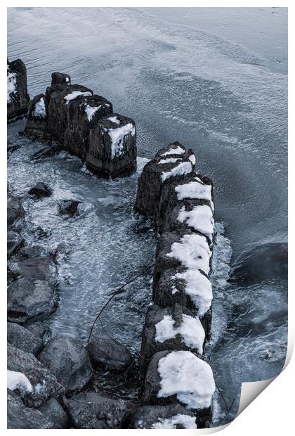 Old Wooden Posts In Frozen River Print by Artur Bogacki