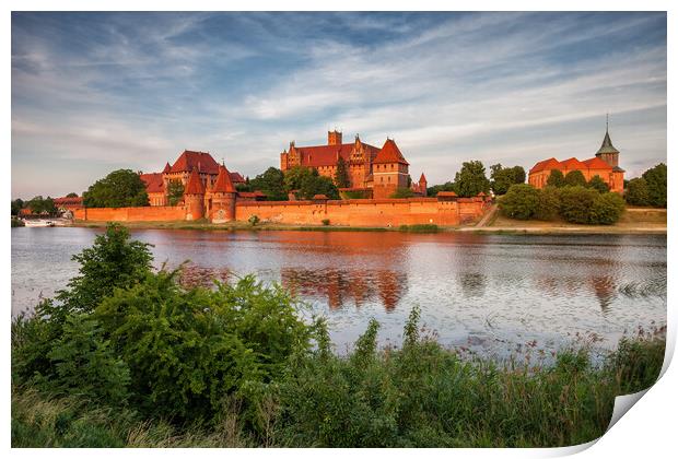 Malbork Castle in Poland at Sunset Print by Artur Bogacki