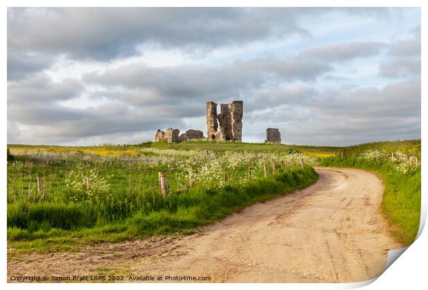 Winding road leading to a chirch ruin in Norfolk Print by Simon Bratt LRPS