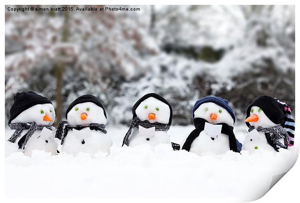 Cute snowman group in snow  Print by Simon Bratt LRPS