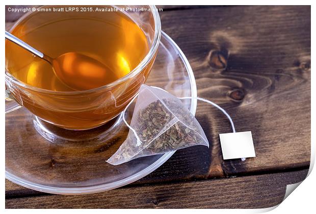 Green tea in glass teacup Print by Simon Bratt LRPS