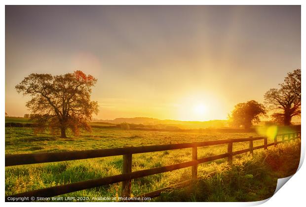 Rural sunrise over fenced field Print by Simon Bratt LRPS