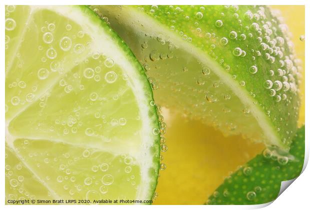 Lemon and lime slices in water Print by Simon Bratt LRPS