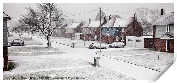 Snow blizzard street scene in rural Norfolk Print by Simon Bratt LRPS