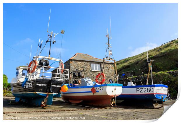 Boats on Mullion Cove slipway pulled up to avoid a storm . Print by Chris Warham