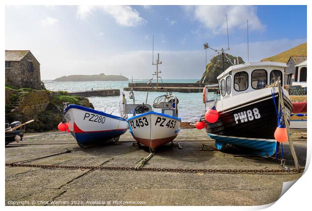 Fishing Boats in Mullion Cove pulled onto the slipway to avoid a storm . Print by Chris Warham