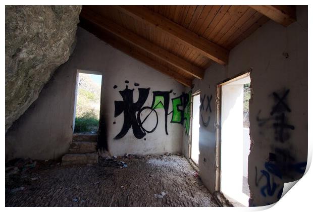 Interior of a derelict house, integrated in the rocks, with graffiti in Setenil Print by Jose Manuel Espigares Garc