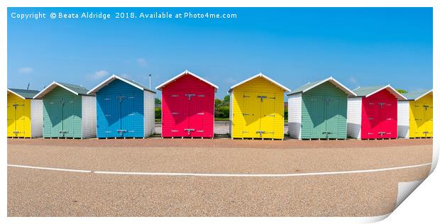 Colorful wooden beach huts in Eastbourne Print by Beata Aldridge