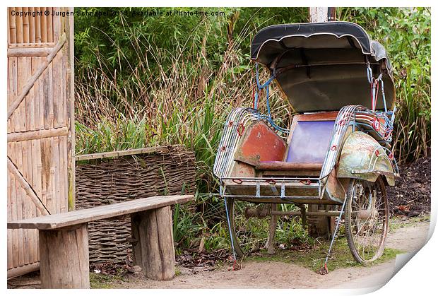  Rickshaw next to a bench Print by Jurgen Schnabel