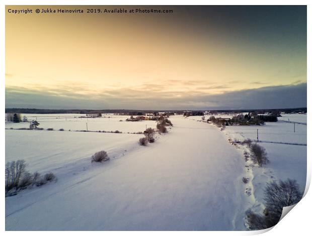 Sunset Over Icy River Bend Print by Jukka Heinovirta