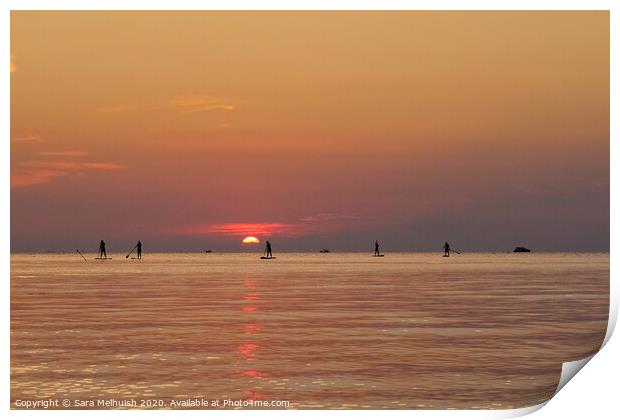 Surfers at sunset Print by Sara Melhuish