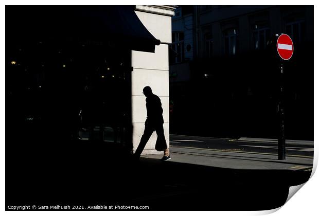 Man on the street in the sunshine Print by Sara Melhuish