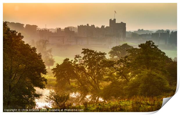 Alnwick Castle at sunset Print by Chris Drabble