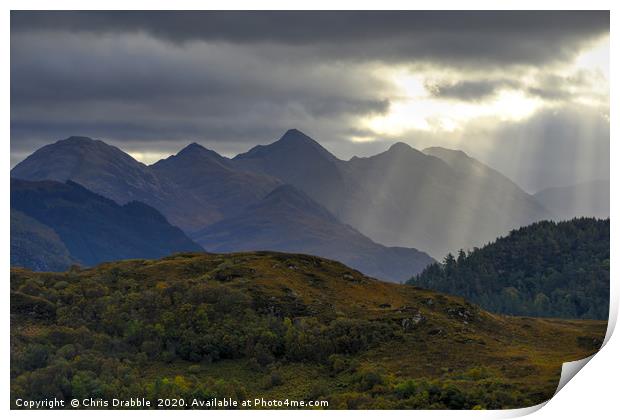 Crepuscular light rays over the Five Sisters Print by Chris Drabble