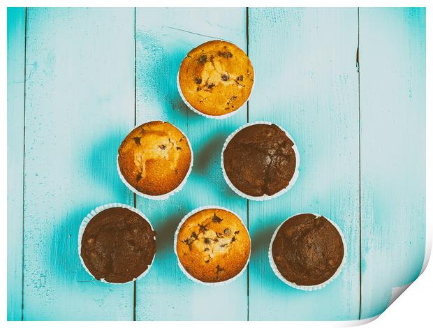 Homemade Chocolate Chip Muffins On Blue Table Print by Radu Bercan