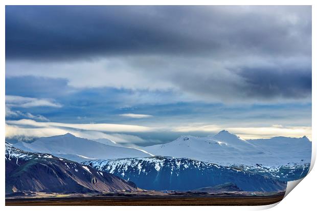 Snow covered mountains south Iceland Print by Nick Jenkins