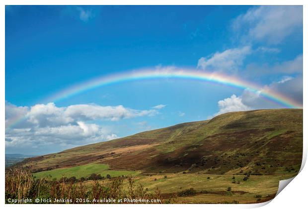 Rainbow over blue sky in the Brecon Beacons Print by Nick Jenkins