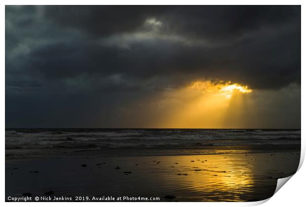 Sunlight through Dark Cloud South Wales coast Print by Nick Jenkins