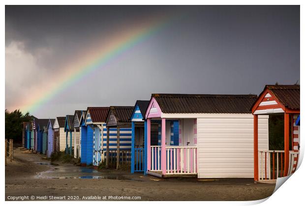 Rainbow over the Beach Huts Print by Heidi Stewart