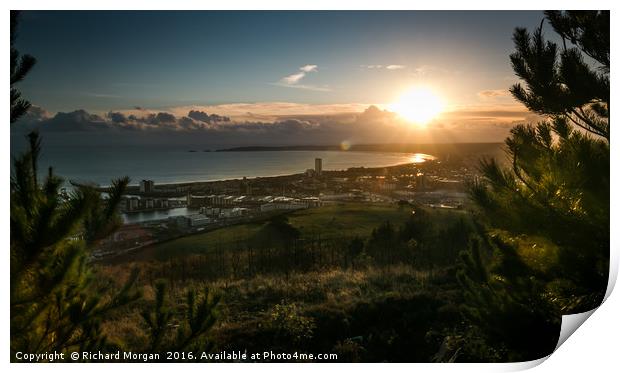 Setting sun over Swansea. Print by Richard Morgan