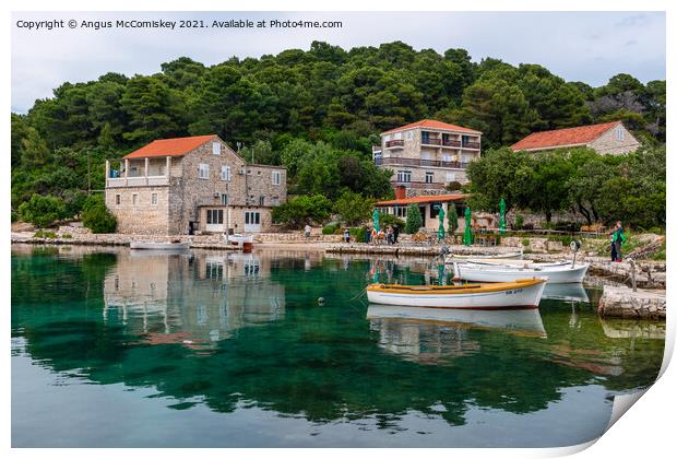 Colourful reflections in Pomena harbour, Croatia Print by Angus McComiskey